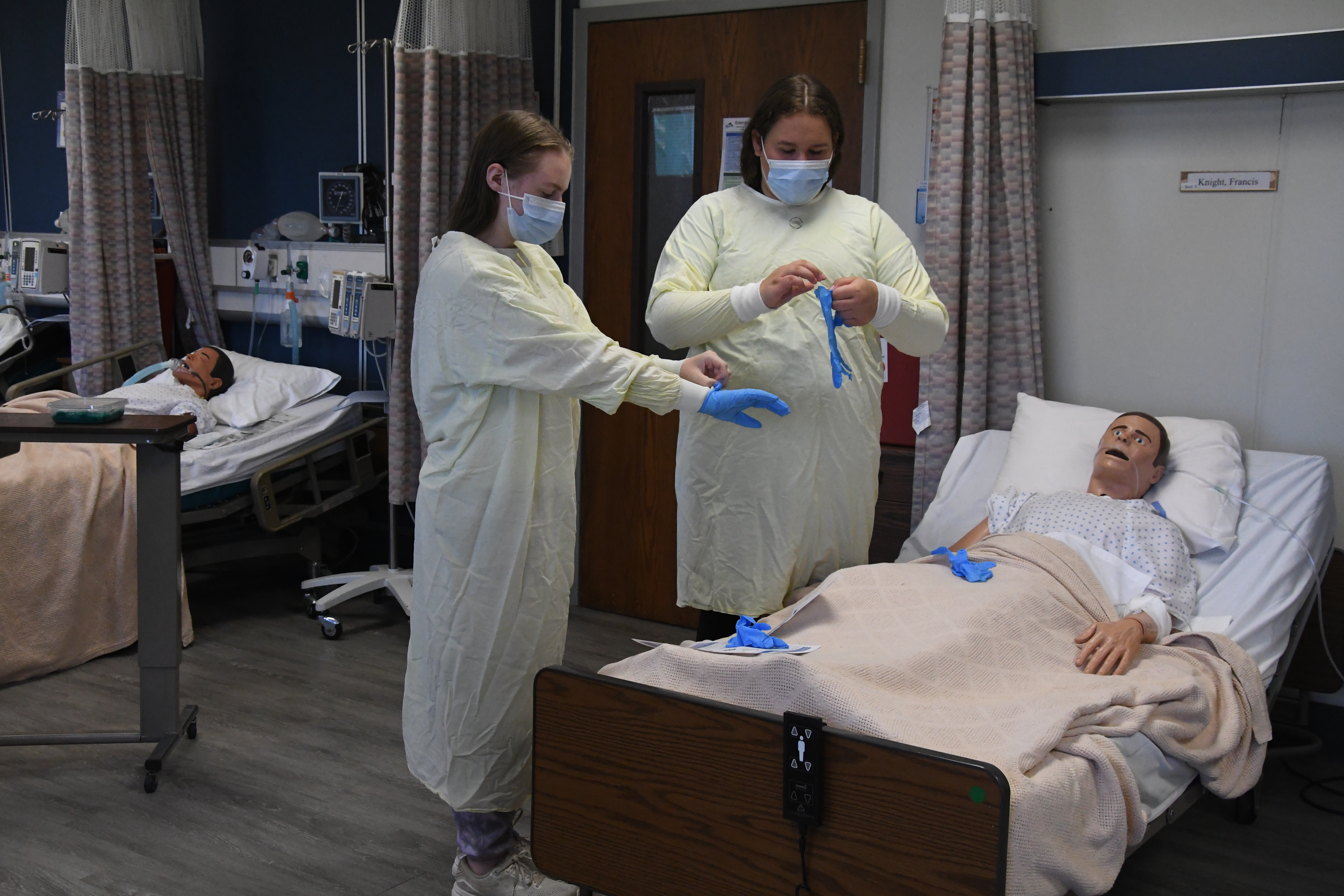 students in protective gear
